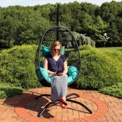 Sunnydaze Decor Sunnydaze Outdoor Resin Wicker Patio Dalia Hanging Basket Egg Chair With Cushions, Headrest, And Steel Stand Set - Teal - 3pc 19 Sunnydaze Decor Sunnydaze Outdoor Resin Wicker Patio Dalia Hanging Basket Egg Chair With Cushions, Headrest, And Steel Stand Set - Teal - 3pc -Crosley Shop GUEST 3776b64b ab75 4ffb a442 a493b35ccab9